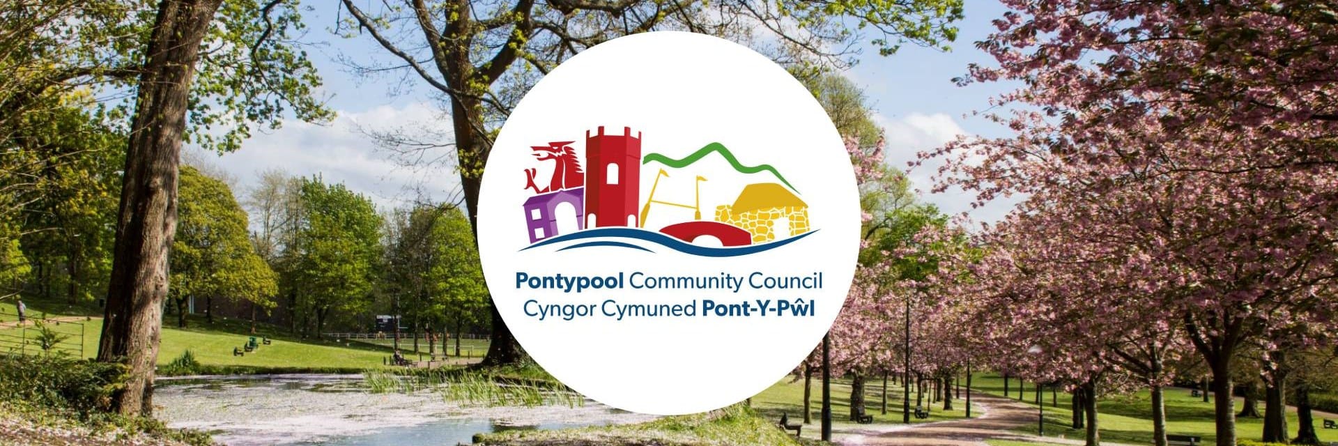 committee change notice strip Pontypool Community Council crest in Pontypool Park